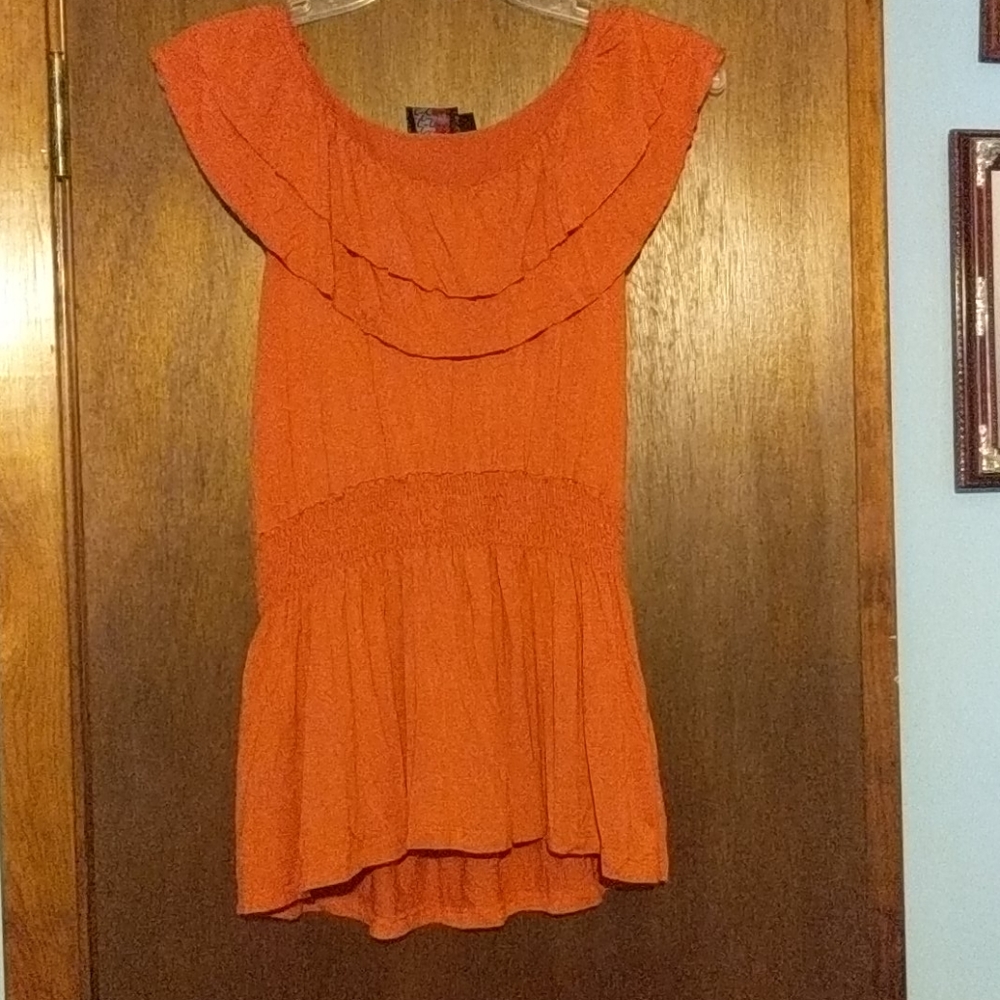 Orange blouse with ruffles
